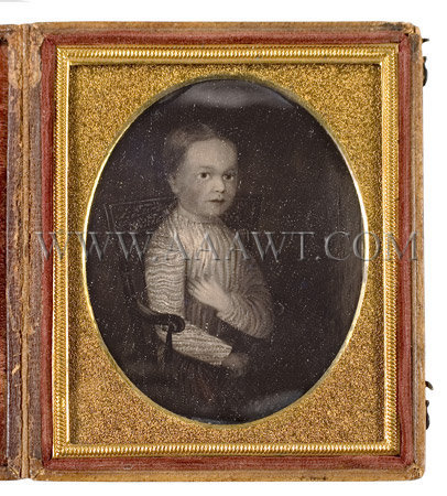 Folk Portrait of a Child Seated in a Paint-Decorated Armchair
American
Circa 1830, entire view